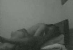 Bitch in stockings naked lie on the black threesome sofa and shows L.