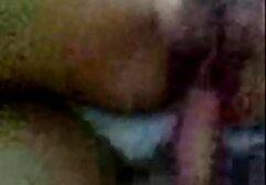 Brunette doing a deep blowjob to a huge black boobs guy